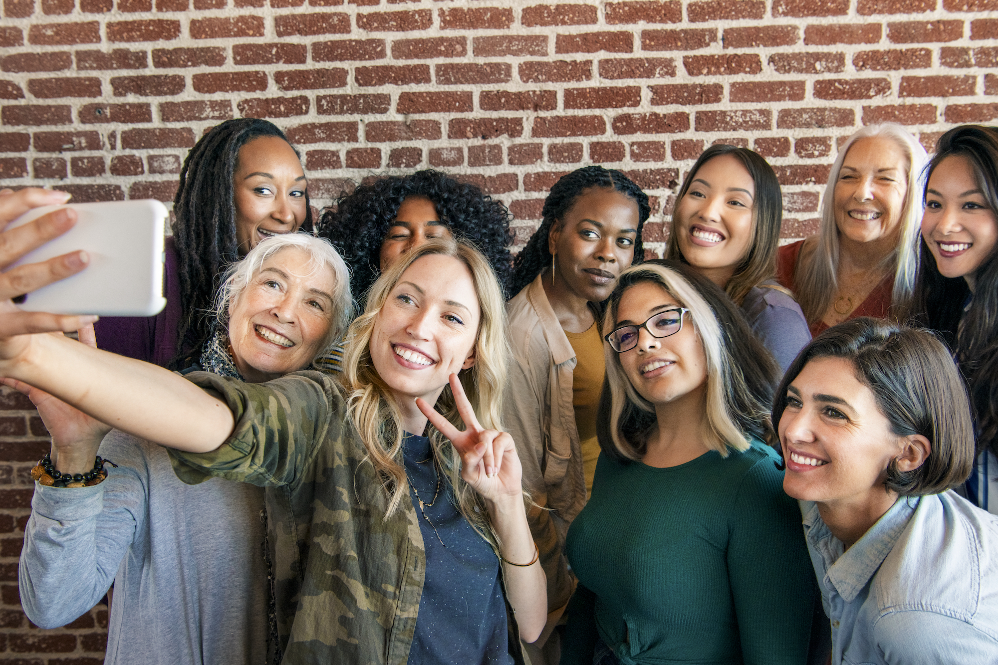 Group of diverse women taking a selfie